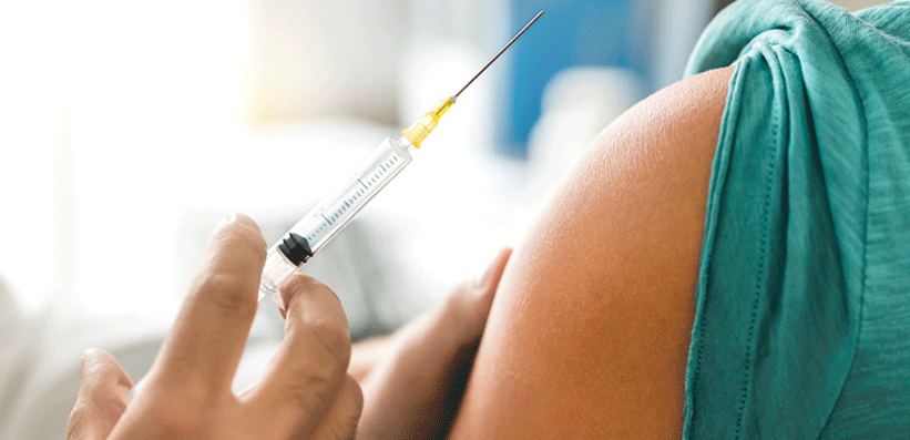 Influenza-Impfung am Oberarm 